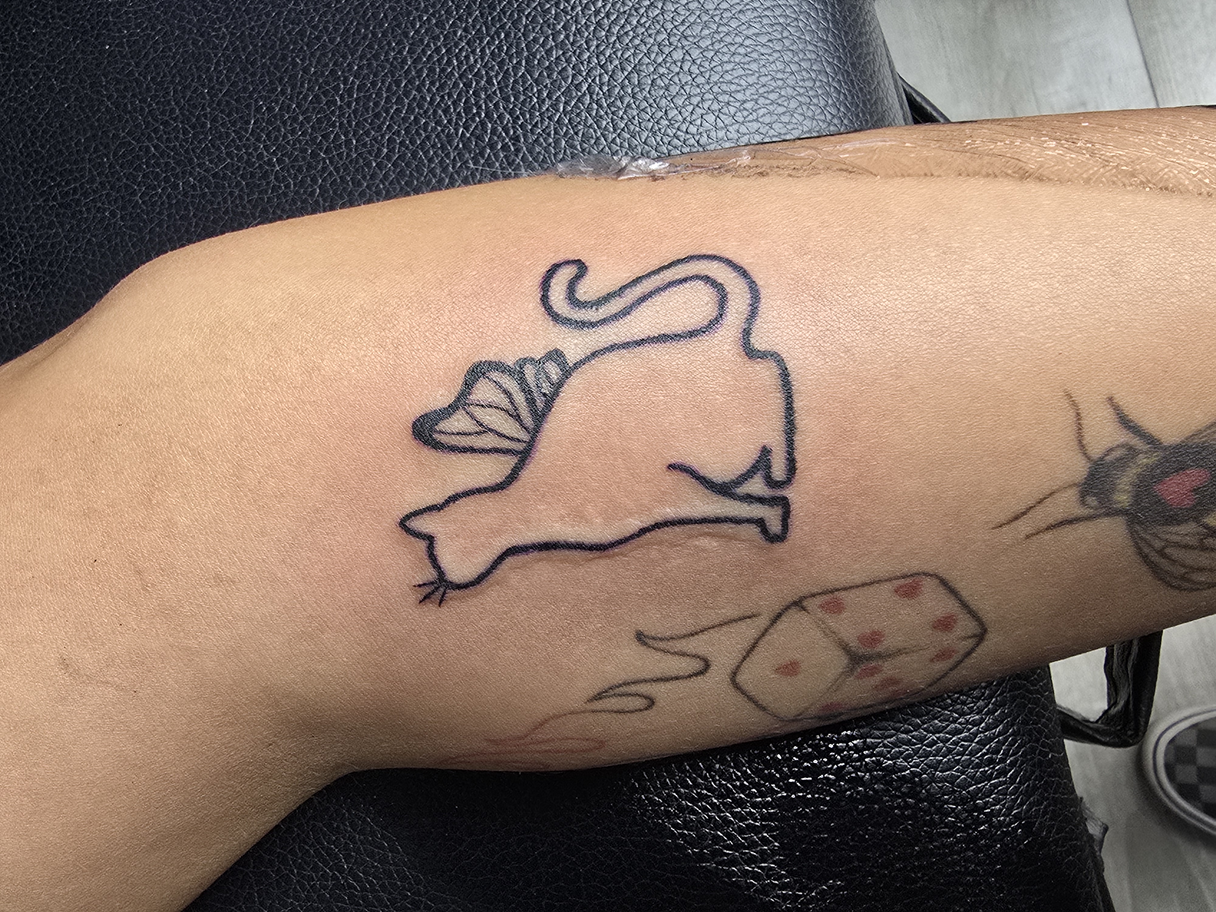 Tera Peters Small to Medium Designs Tattoo Work - Professional Tattoo Artist at Magic Circle Tattoo Bay City MI