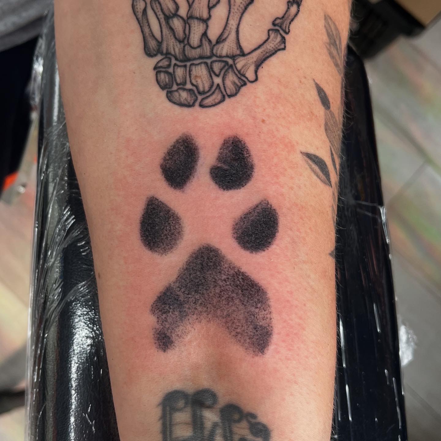 Dog Pawprint Memorial by Bella Lagalo - Professional Black and Gray Tattoo - Magic Circle Tattoo Bay City Michigan