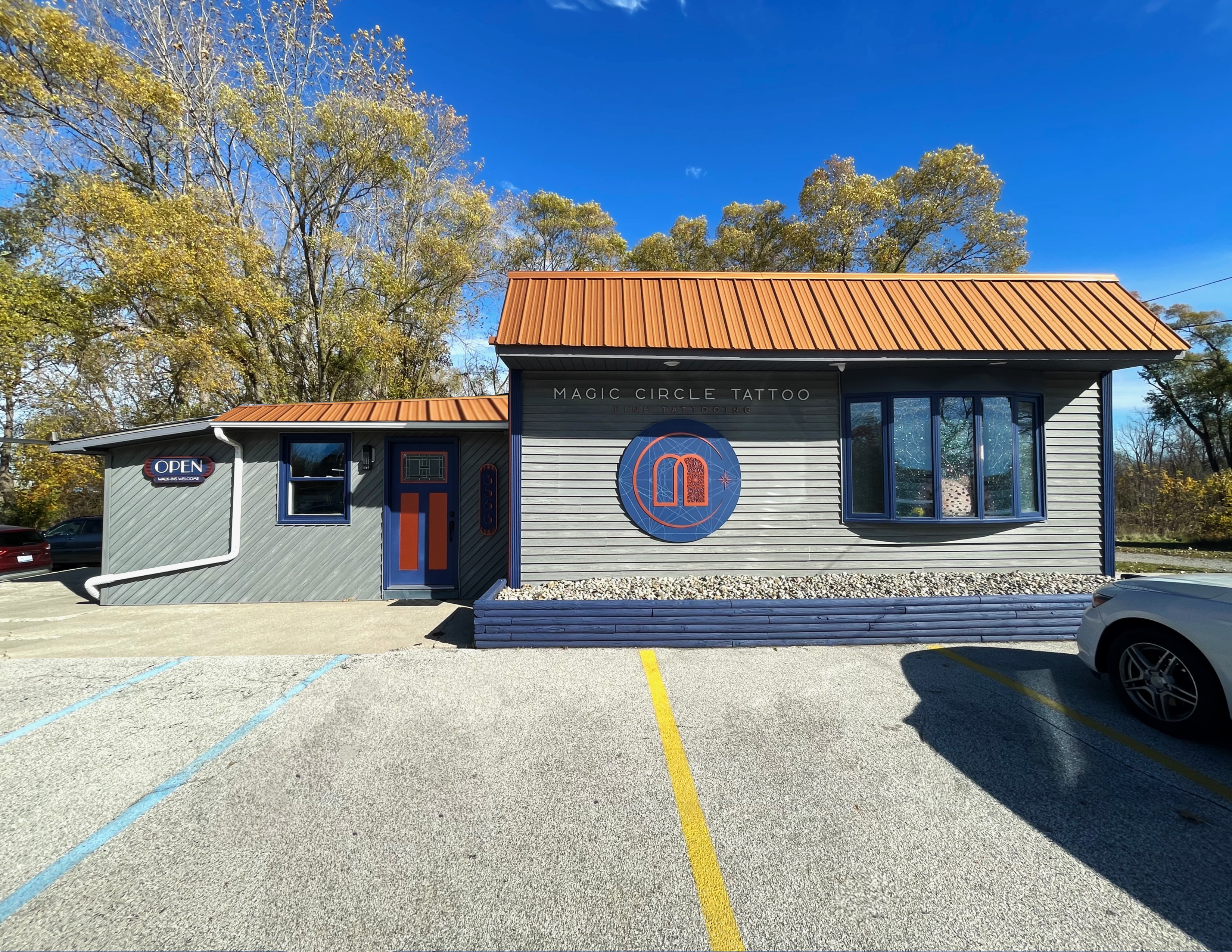 Magic Circle Tattoo Exterior - Bay City Michigan Professional Tattoo Studio with Distinctive Copper Roof and Modern Design